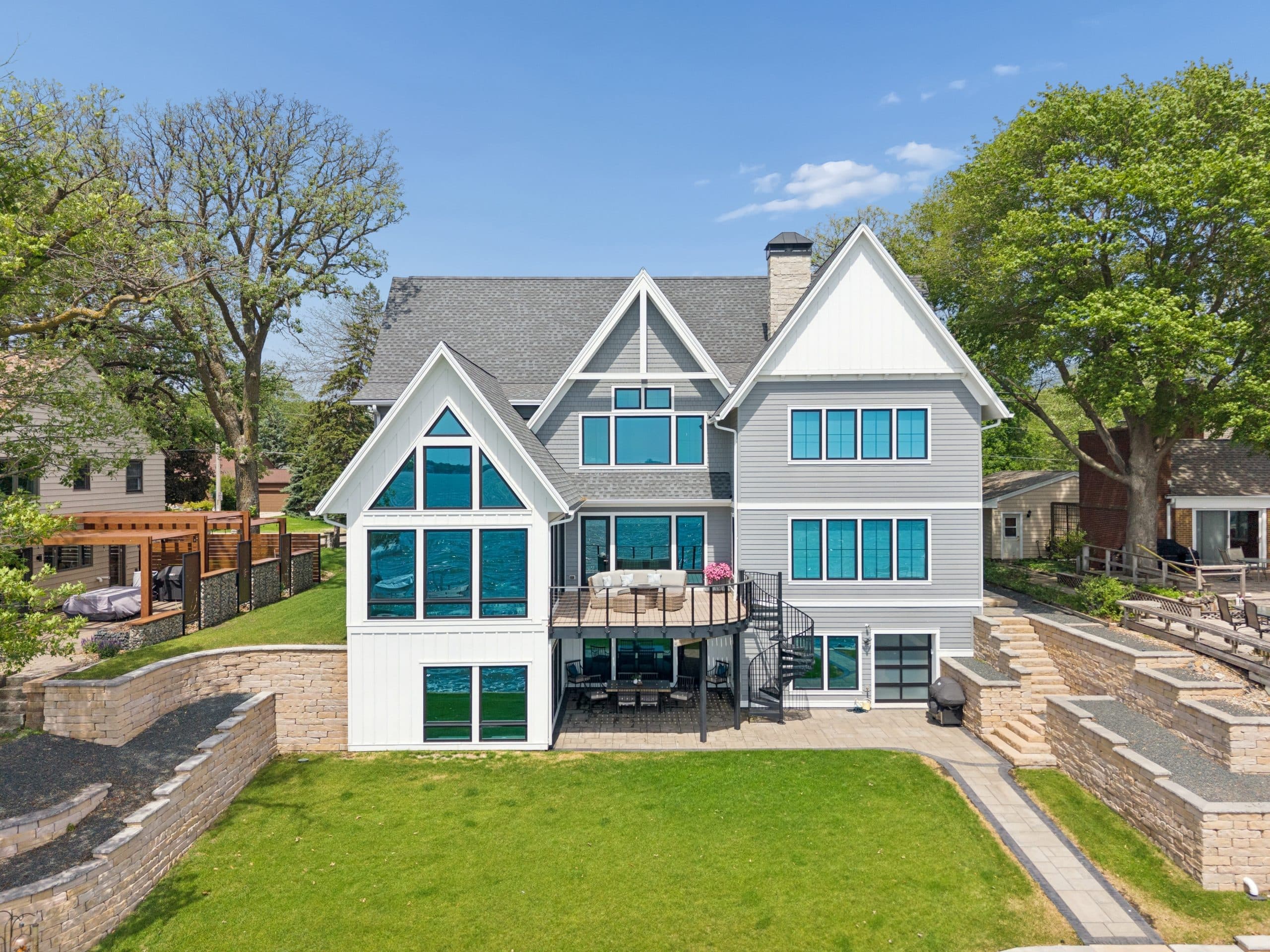 Modern lakefront home with a walk-out lower level