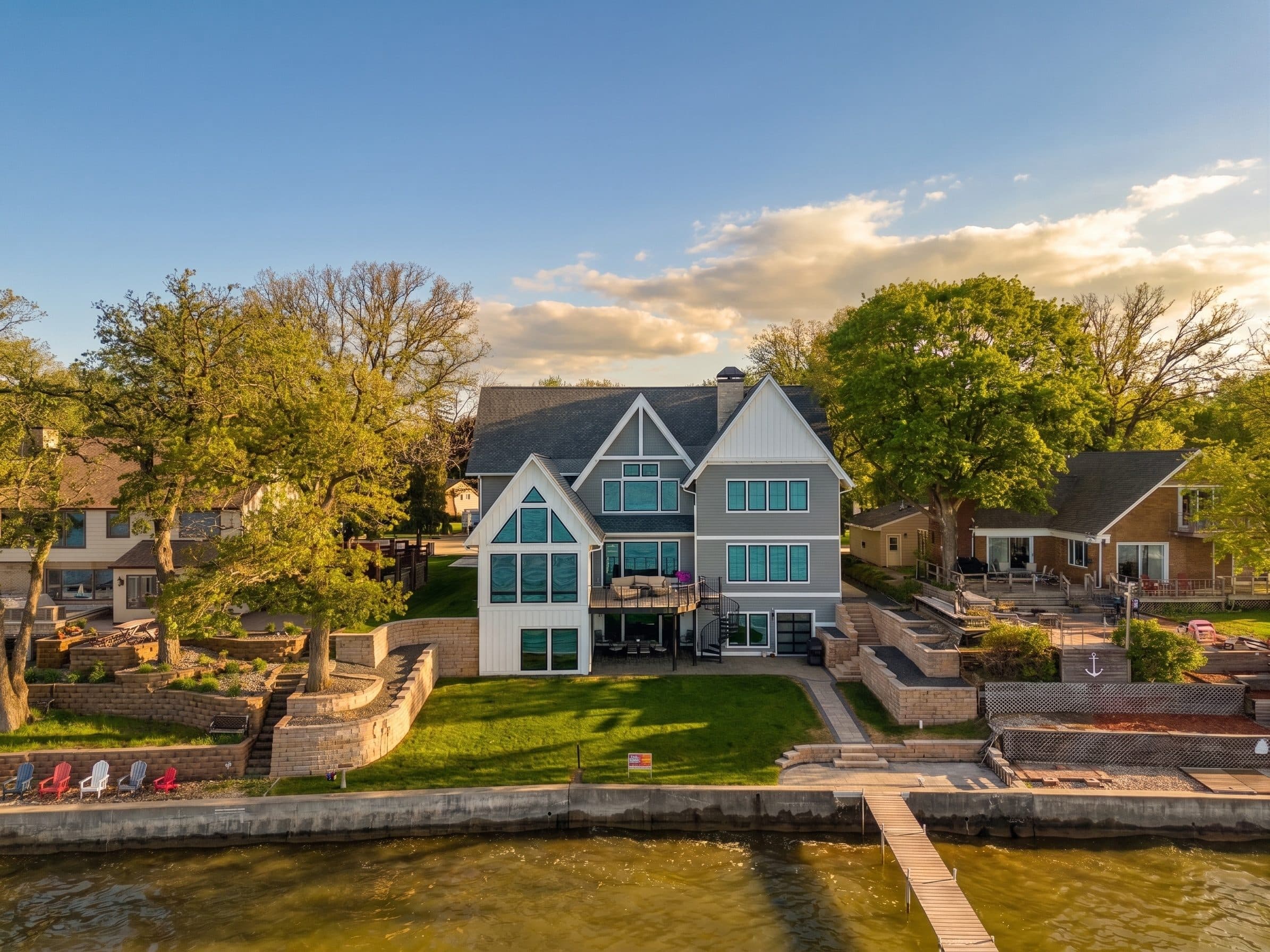Lakefront homes on Clear Lake at golden hour, seen from the water