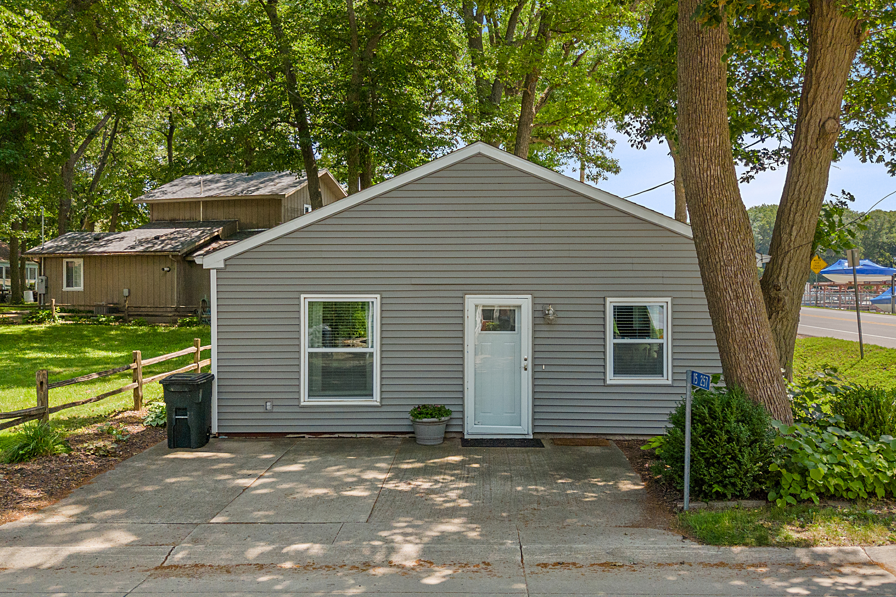A charming single-story cottage on Pascal Street framed by mature trees