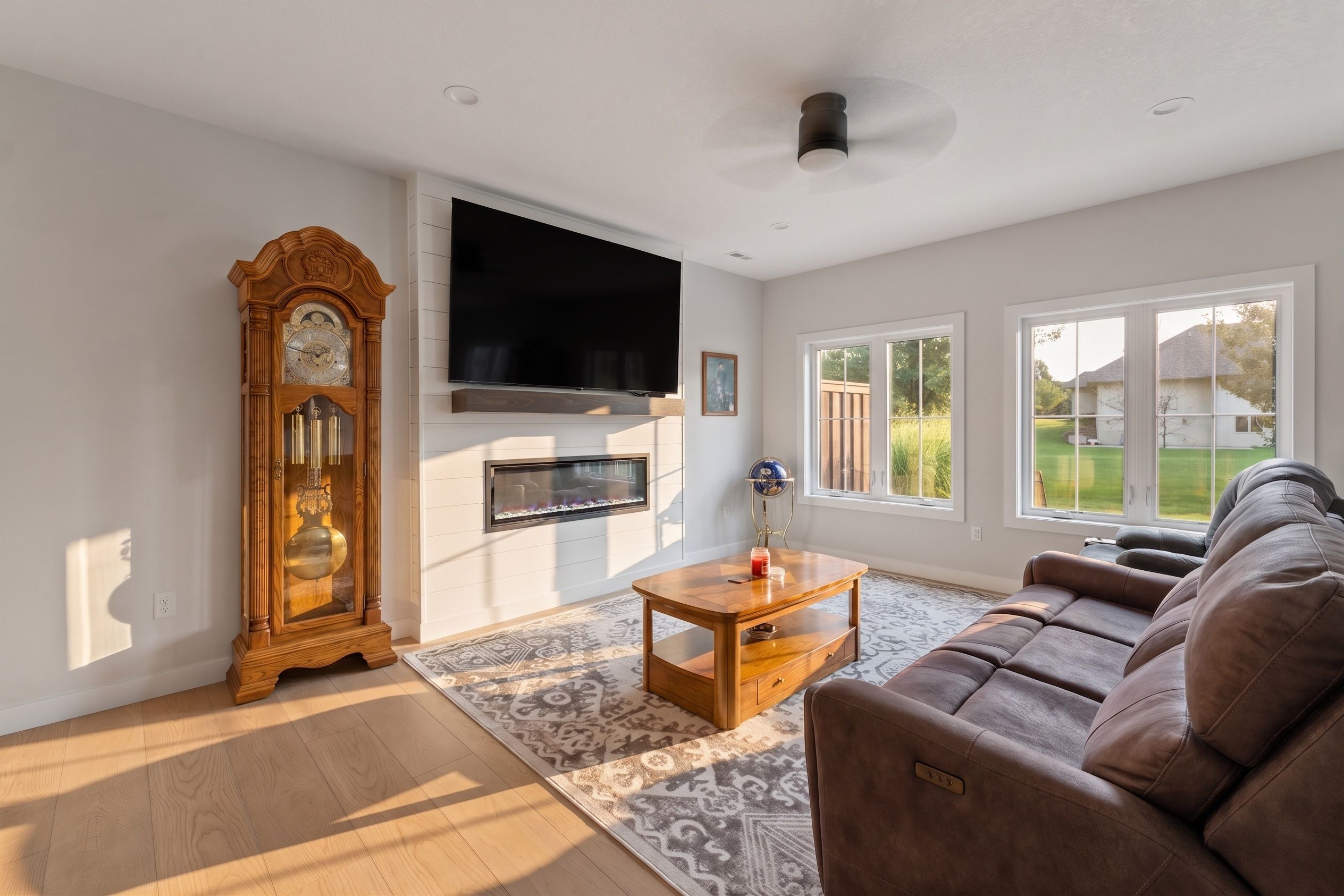 Warm, inviting living room with fireplace in a Clear Lake, Iowa home